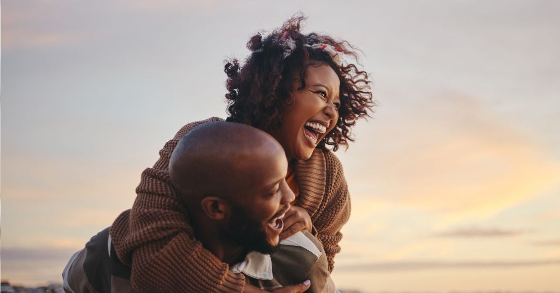 woman laughing with man