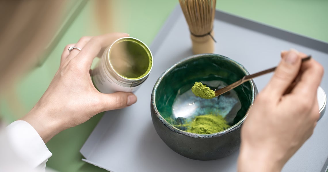 woman preparing matcha tea