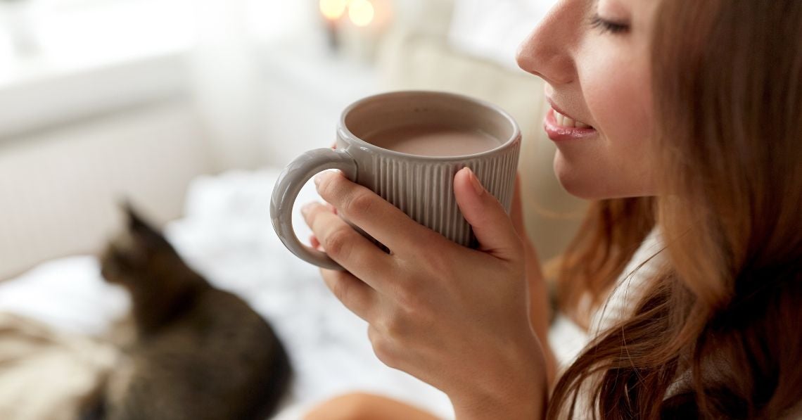 woman drinking hot cocoa
