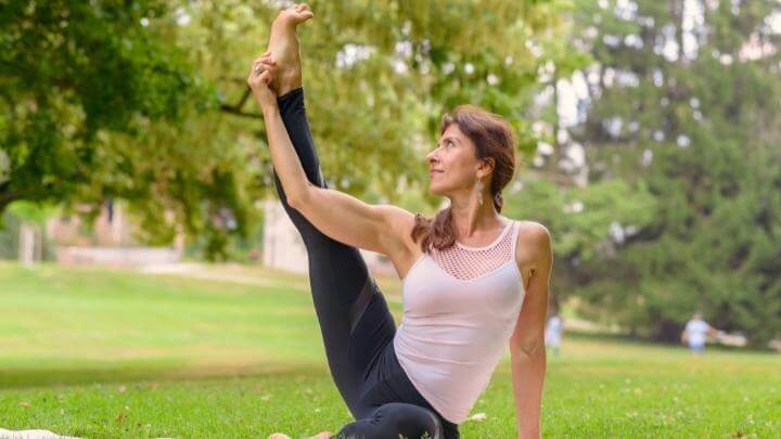 Woman doing yoga in the park