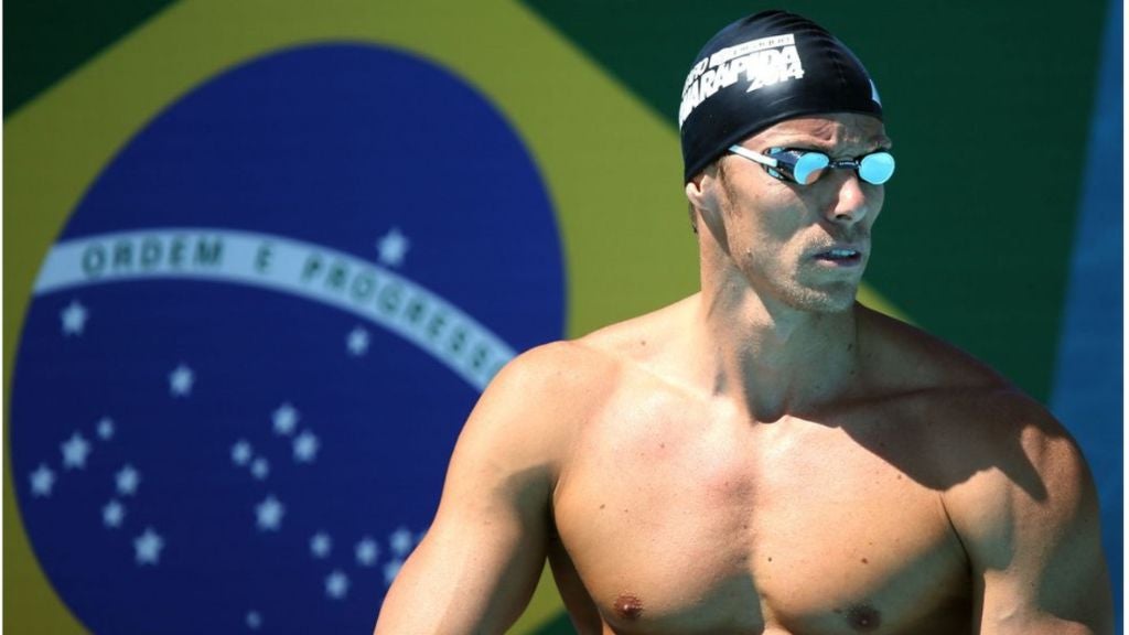 Olympic athlete Roland Schoeman with goggles and swim cap
